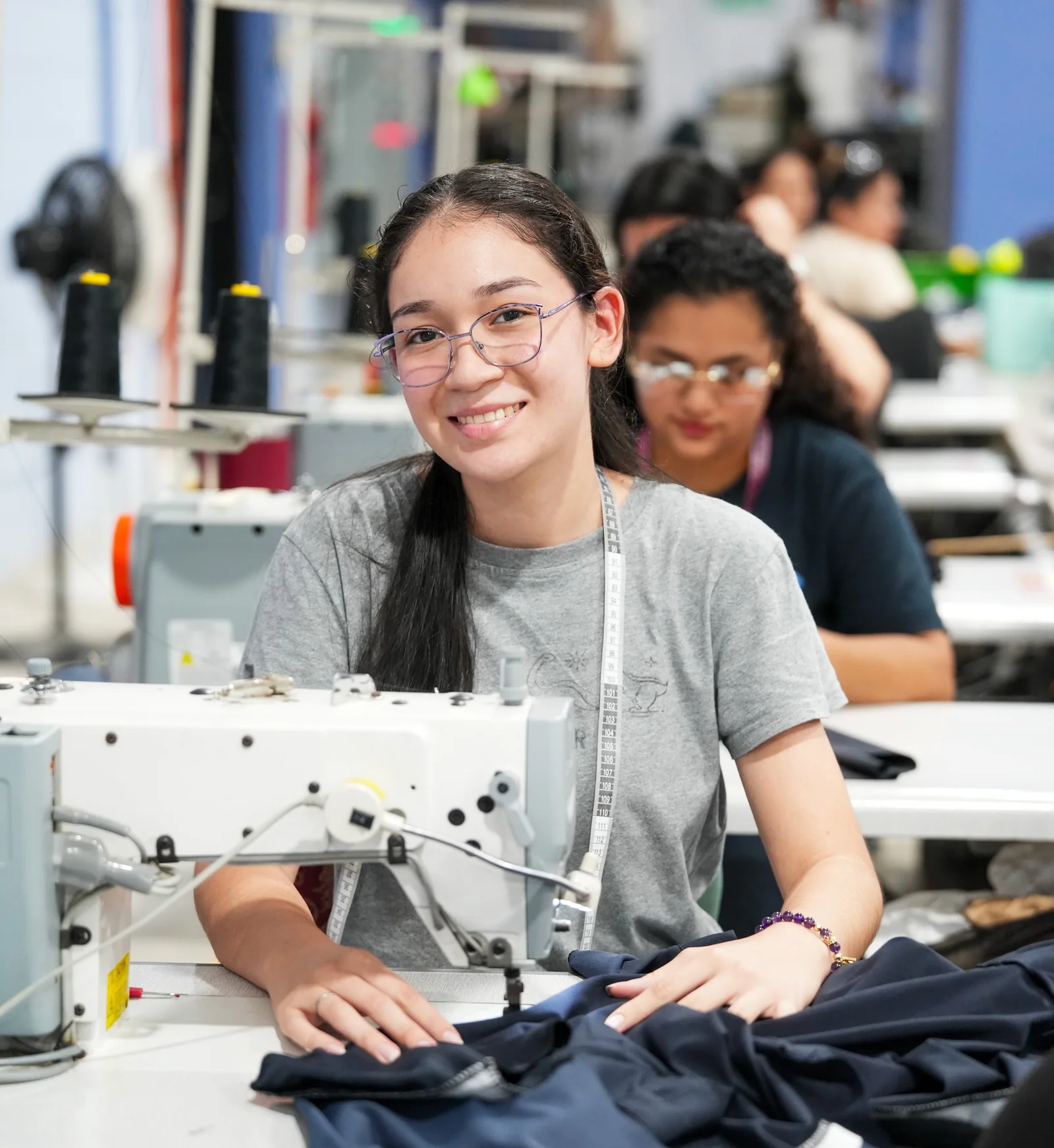 Woman working in Honduras manufacturing